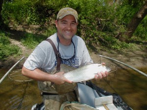 DNREC Matt Fisher catches hickory shad in White Clay Creek May 2010
